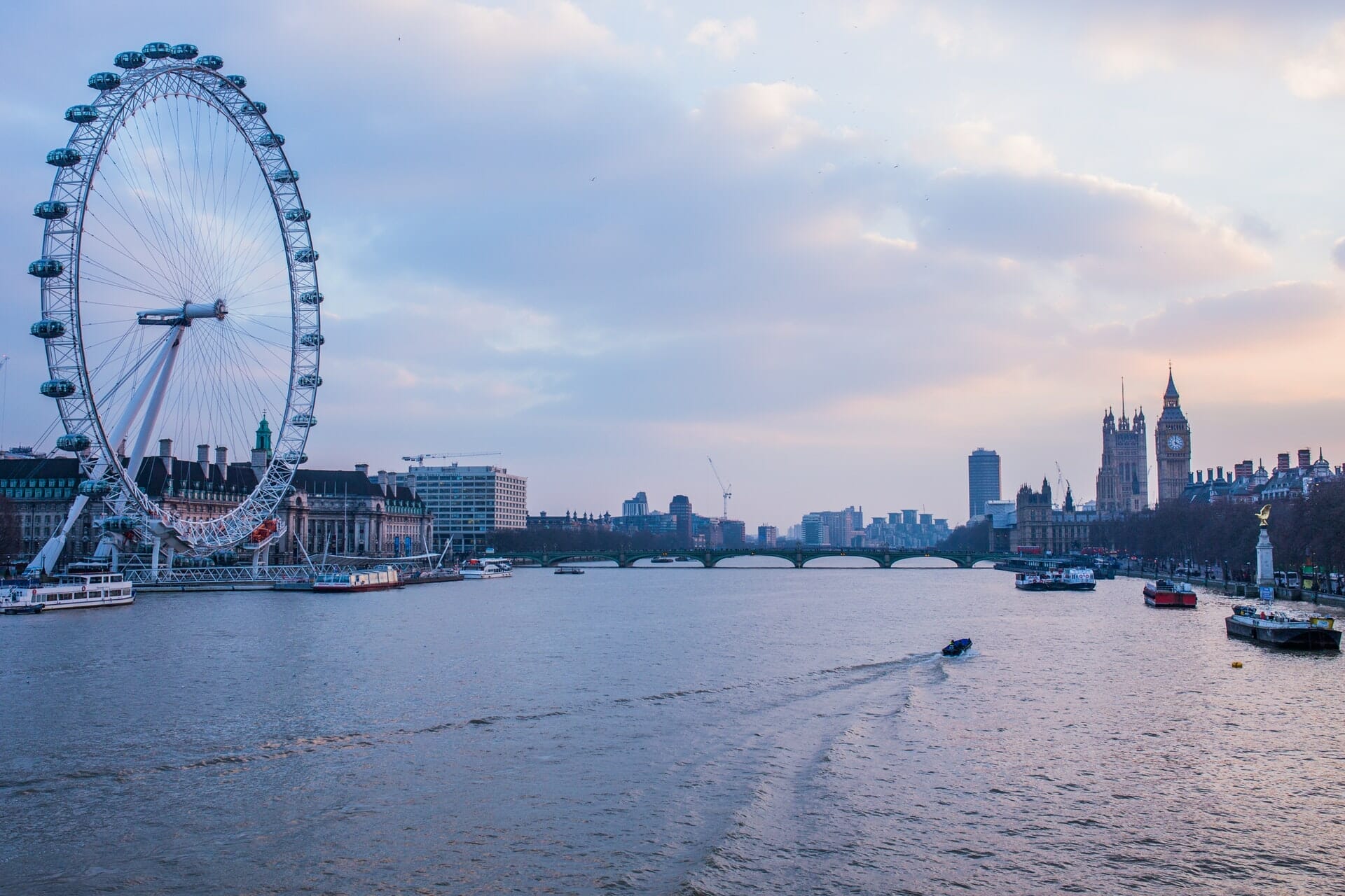 The River Thames in London with the London Eye to the left and Big Ben to the right