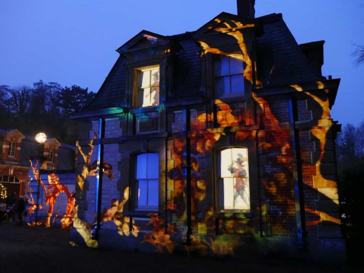 A projection on the stables at Waddesdon Manor at Christmas
