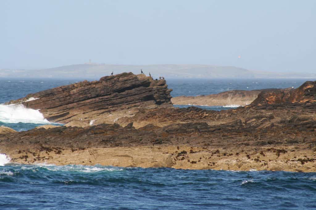 water crashing against rocks