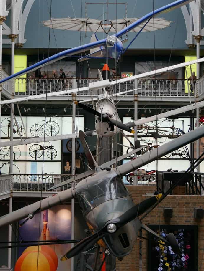 Three planes hanging from the roof of the National Museum of Scotland