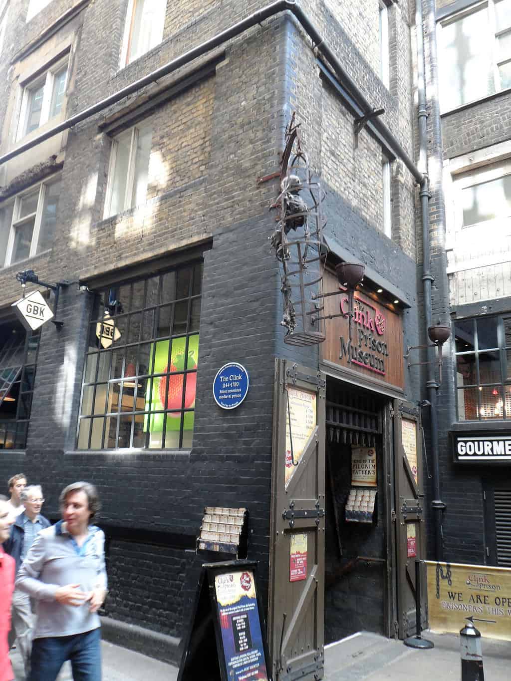 Clink Prison Museum in London with people walking past