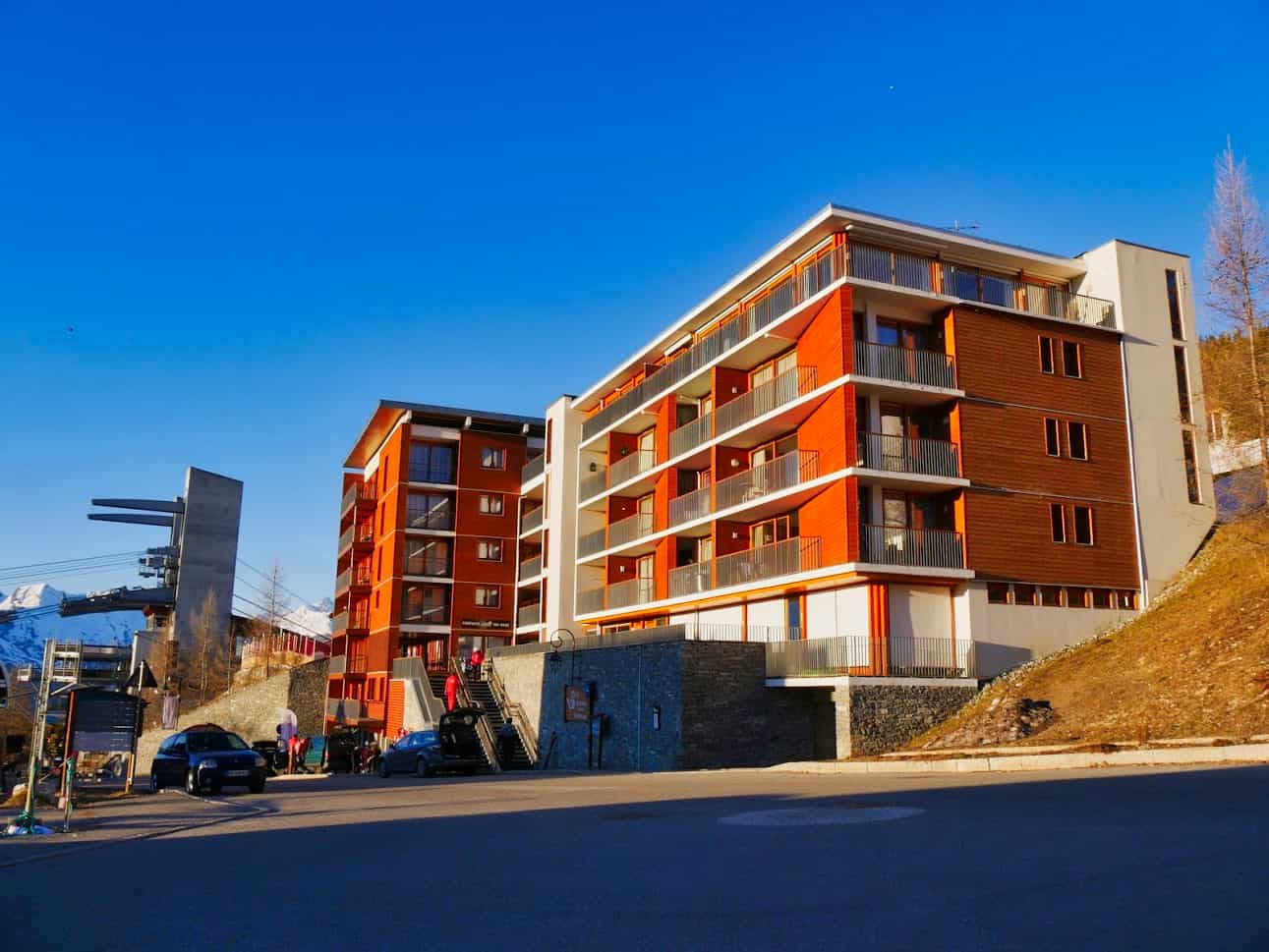 Ski apartment building with Vanoise Express to the left