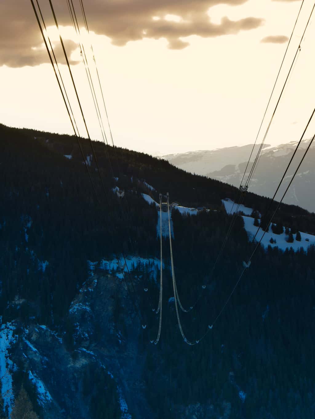 Cable car cables from Peisey-Vallandry looking at La Plagne over valley