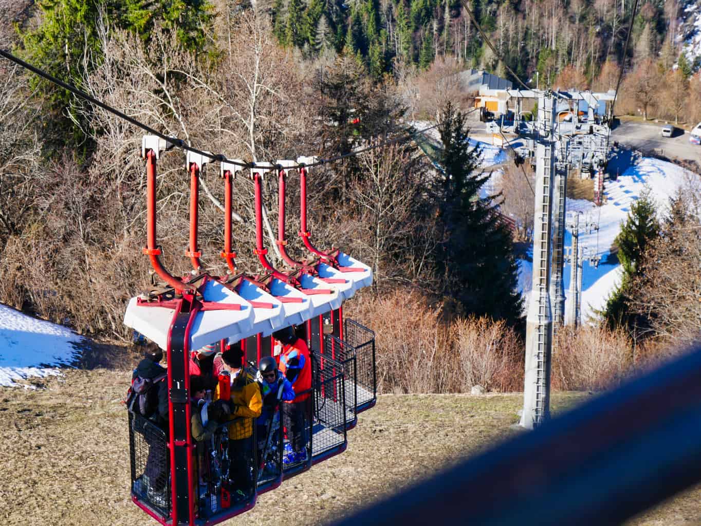 Lonzagne lobster bucket lift with people inside cages