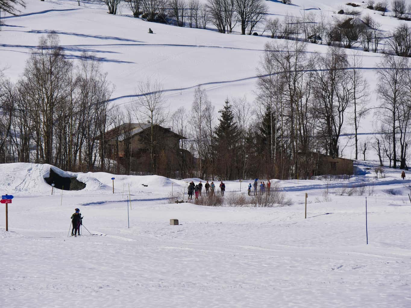 Nordic Ski Area in Peisey-Nancroix covered in snow with people skiing and walking