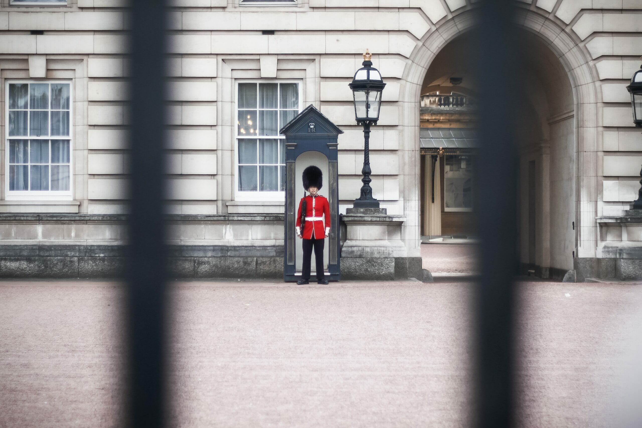 Guard in red at Buckingham Palace