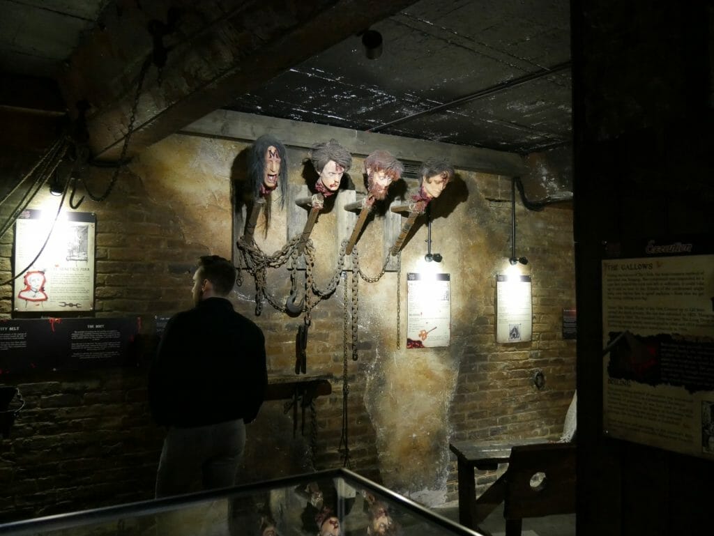 Decapitated heads on poles at The Clink Museum in London Bridge