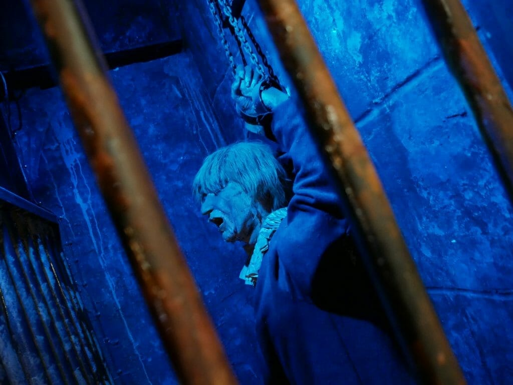 A model of a person in a jail cell at The Clink prison Museum London Bridge