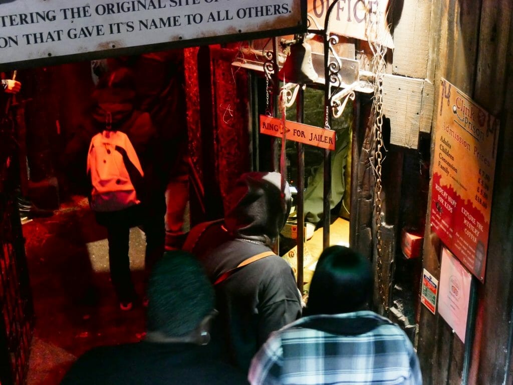 Clink Prison Museum entrance with people buying tickets