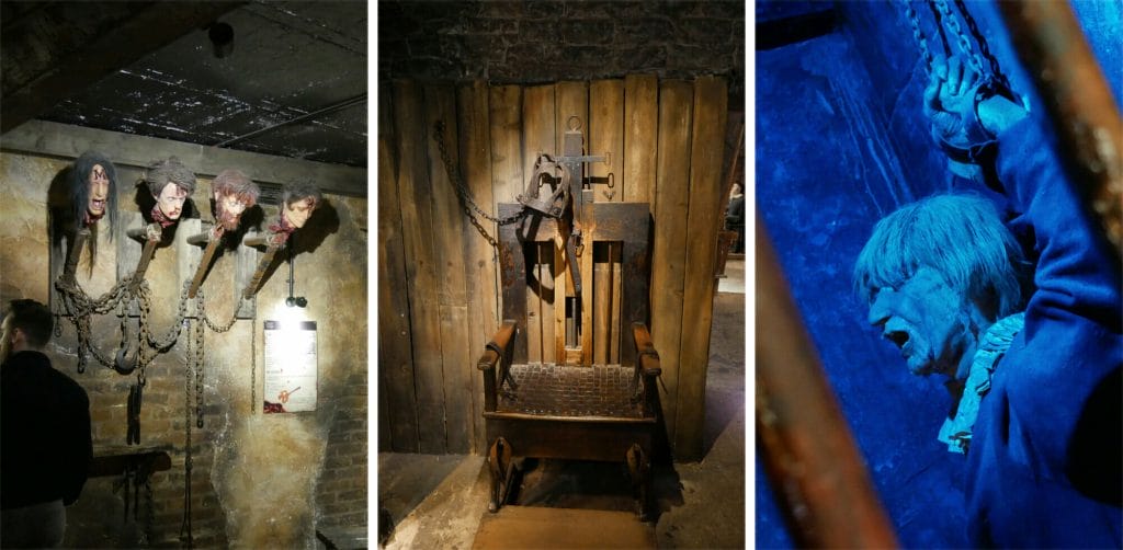 Beheaded heads on poles, torture chair, model of a man in a prison cell at Clink Prison Museum