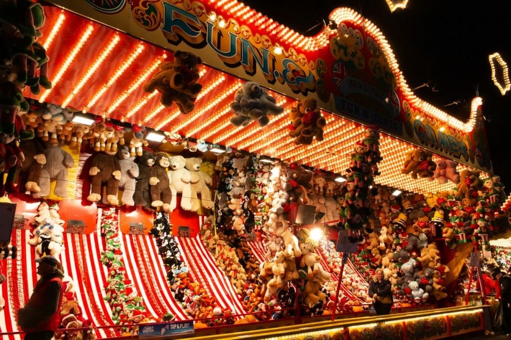 A basketball hoop stall with cuddly toys at Hyde Park's Winter Wonderland in London