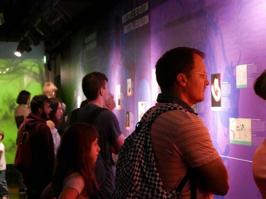 People looking at information walls at the German Spy Museum, Berlin
