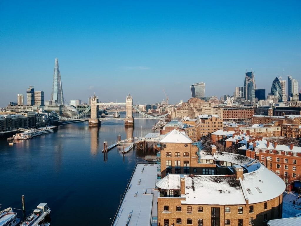 View of London with the River Thames and The Shard, with light snow on the rooftops