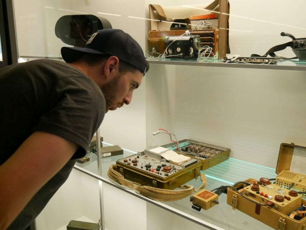 A man looking at a display at the German Spy Museum, Berlin