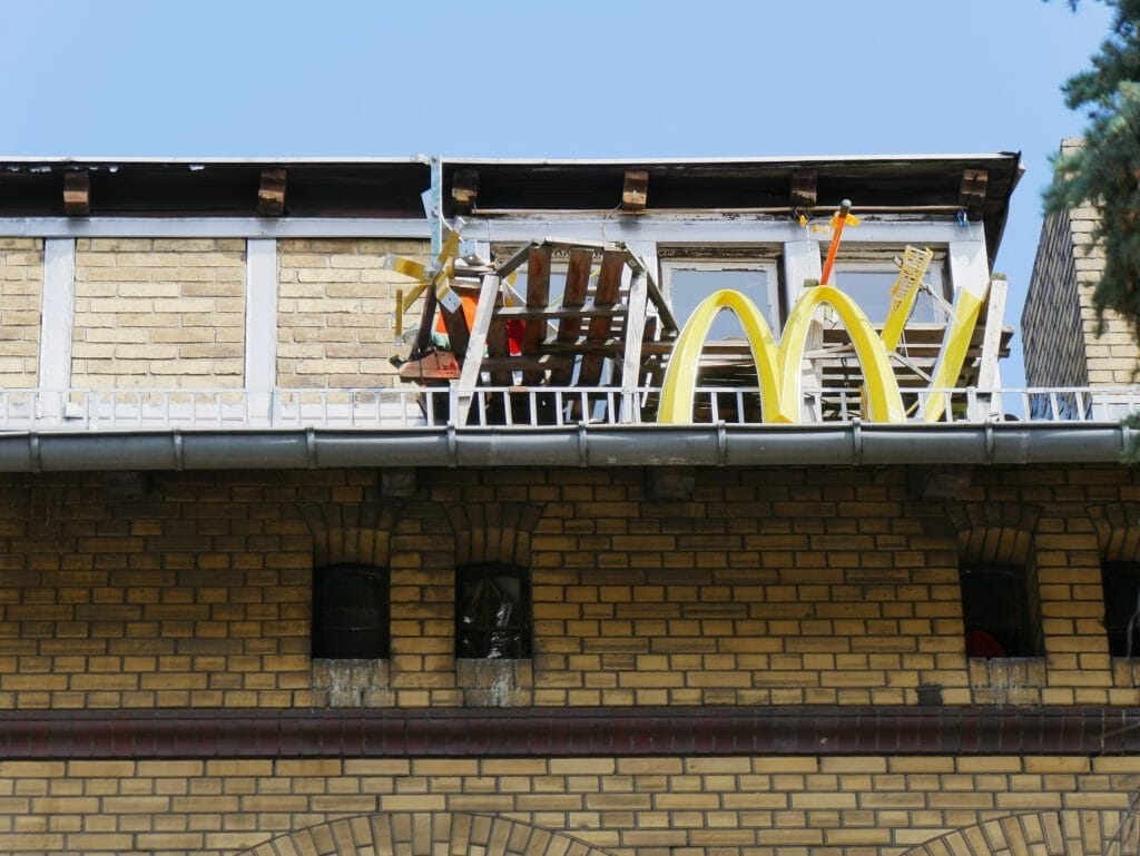 A stolen McDonald's sign on a rooftop in Berlin