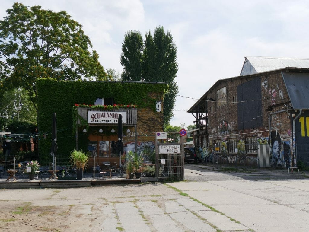 A bar covered in graffiti on the Berlin food tour