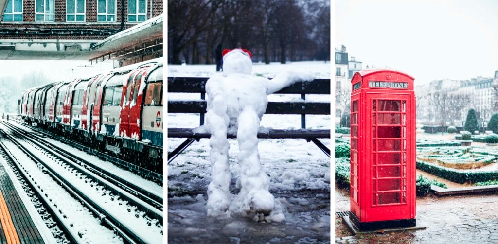 London underground train and tracks covered in snow, a snowman on a bench, a red phone booth with snow falling