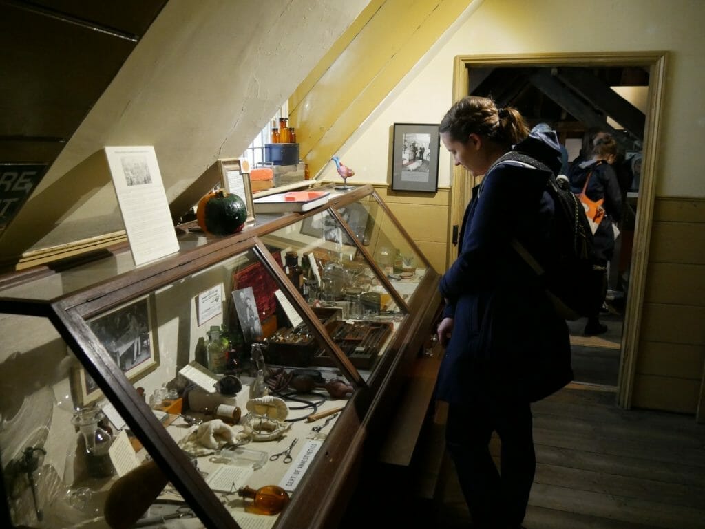 Kalyn looking in cabinets at the Old Operating Theatre, London