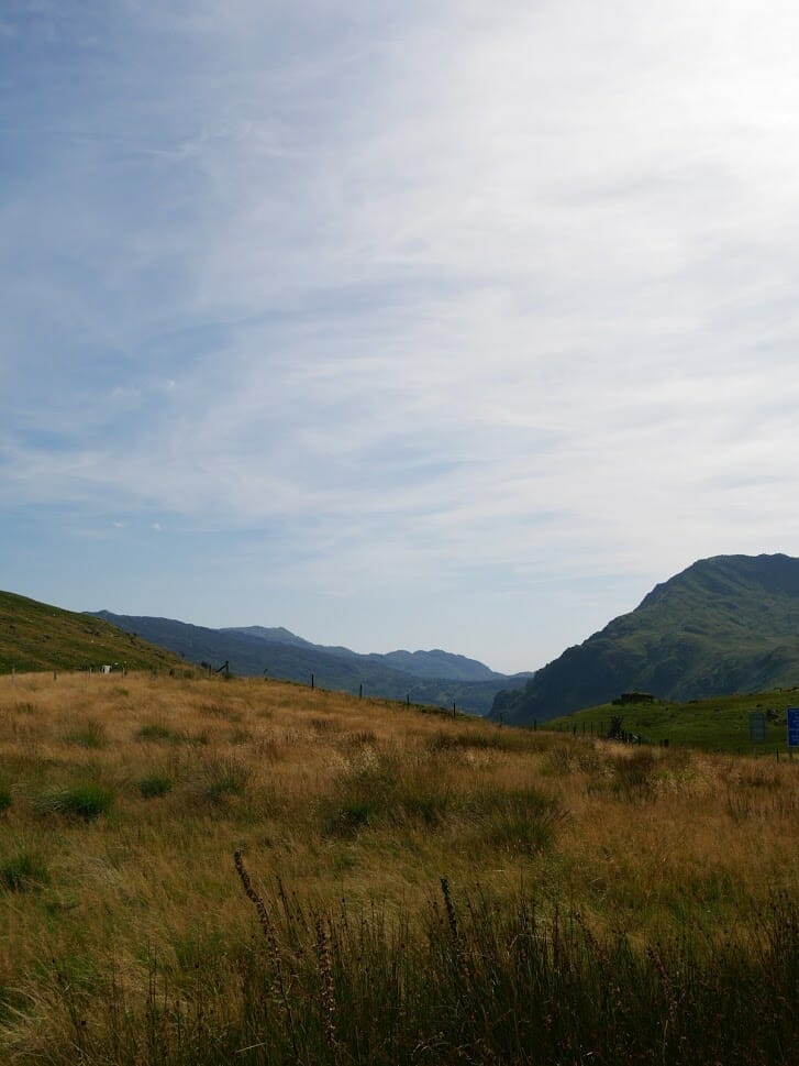 A valley through North Wales with mountains either side