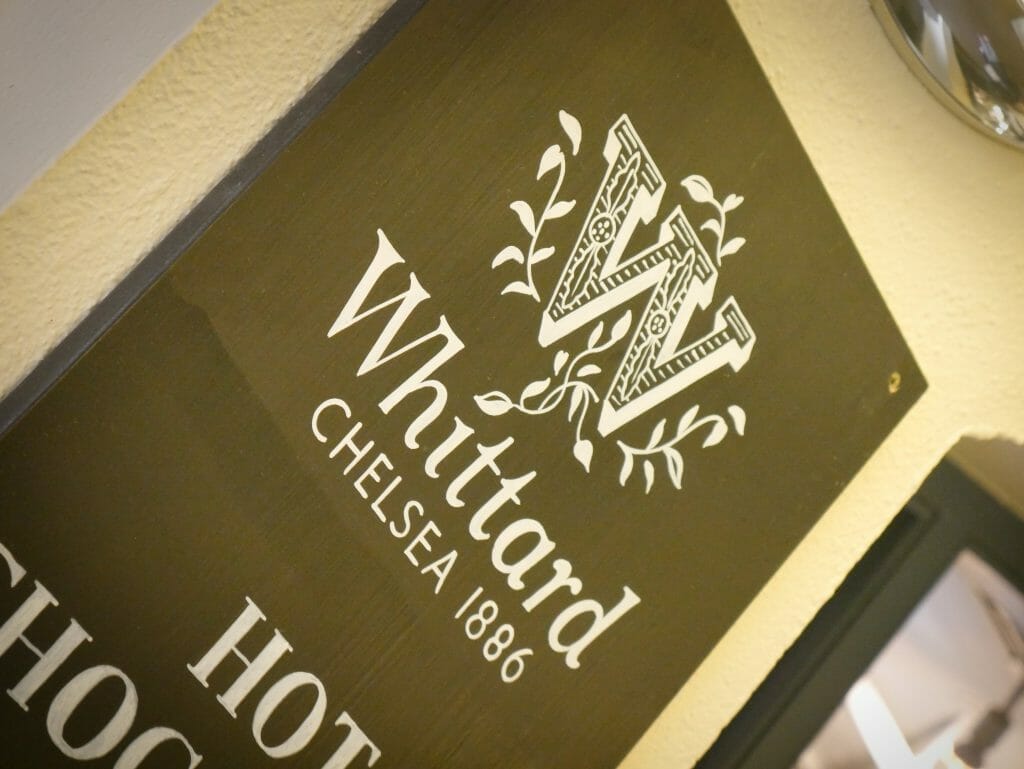 A sign for Whittard Chelsea outside the entrance