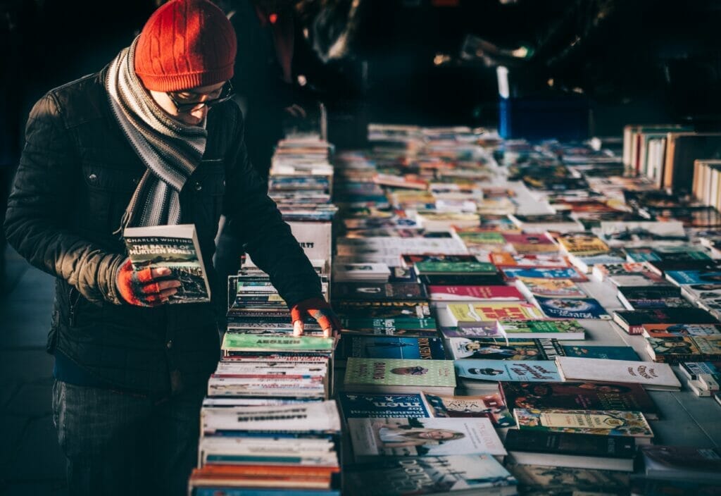Man browsing books in London