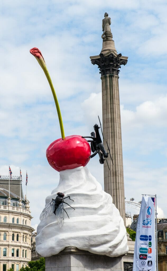 statue of ice cream with flies on it as fourth plinth in trafalgar square