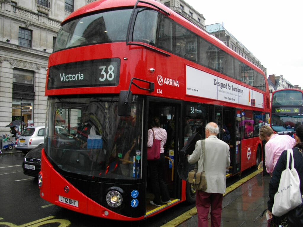 people getting onto the 38 bus in London to Victoria